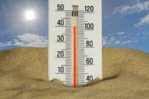 The thermometer shows a very hot temperature.
